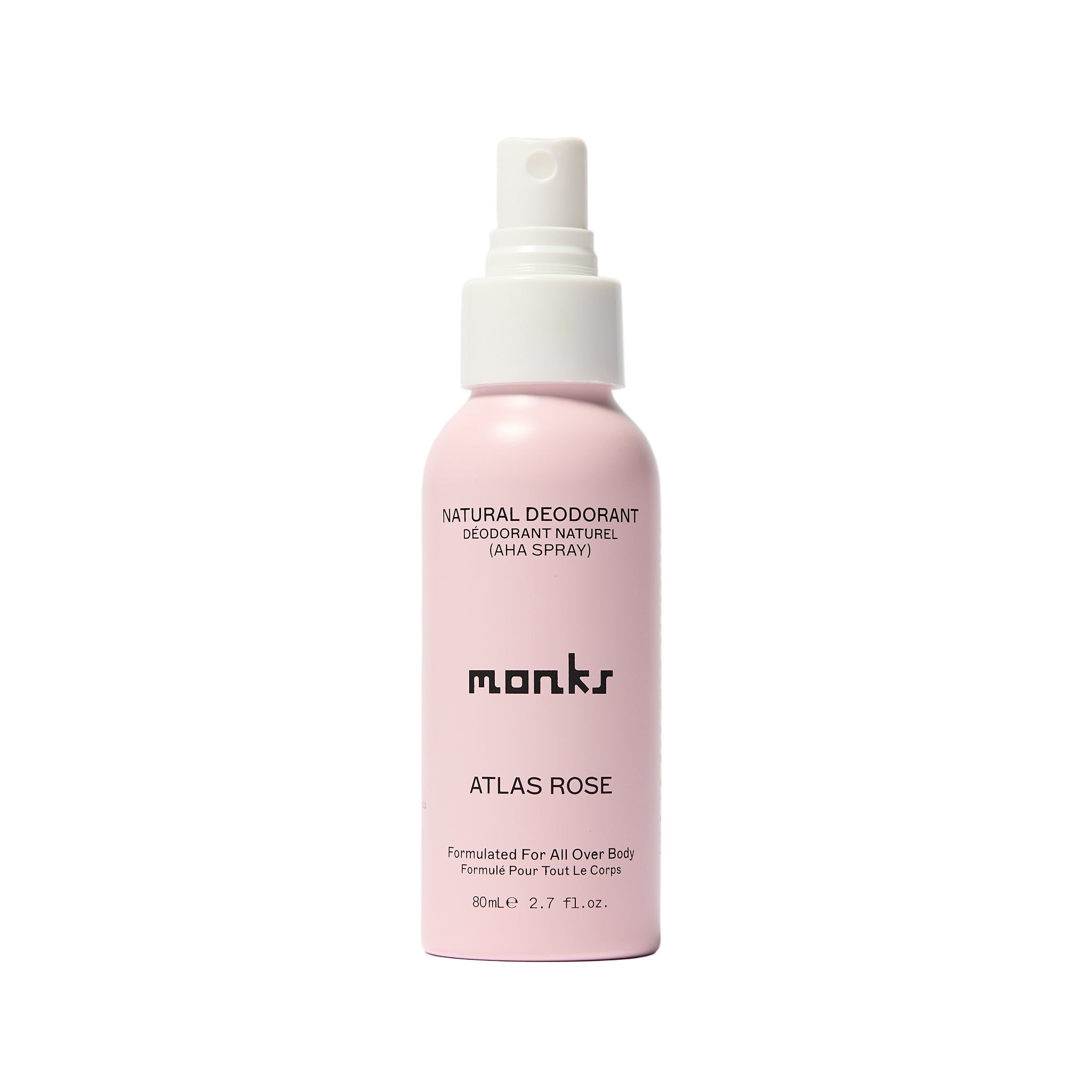 Pink deodorant spray bottle labeled 'monks' on a white background